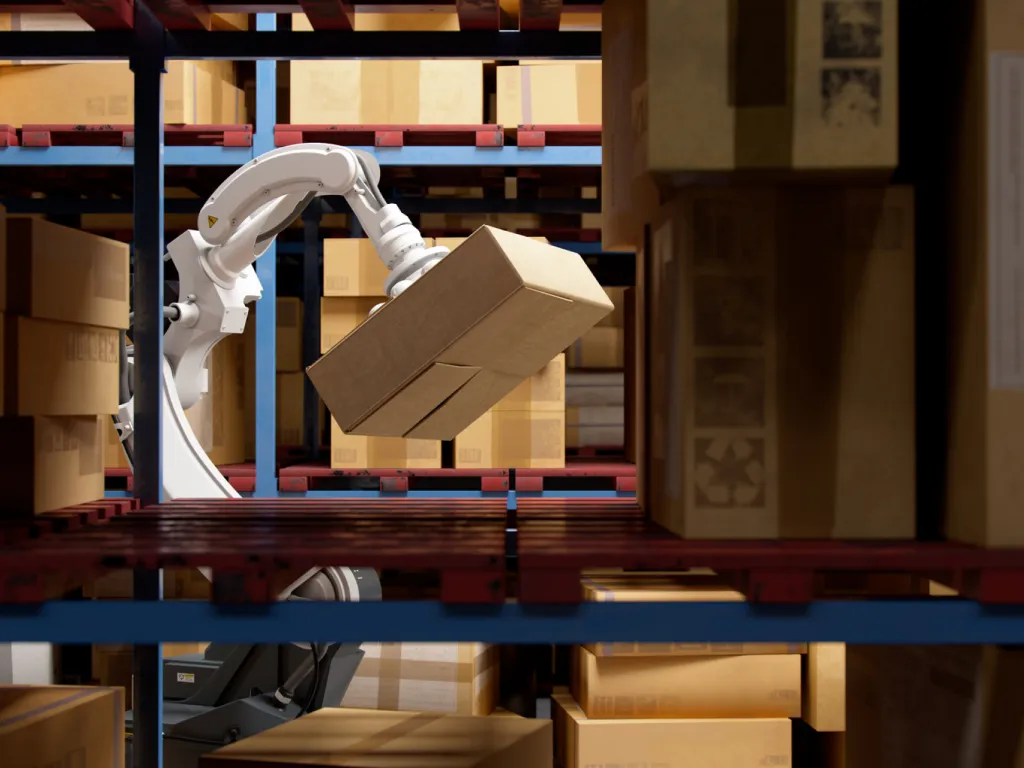 Robot lifting package in fulfillment facility